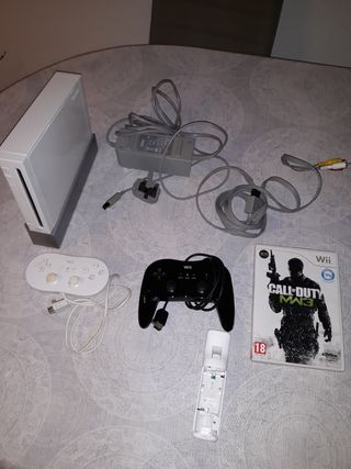 Wii con tres mandos y juego