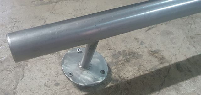 Apoya píes de acero inoxidable