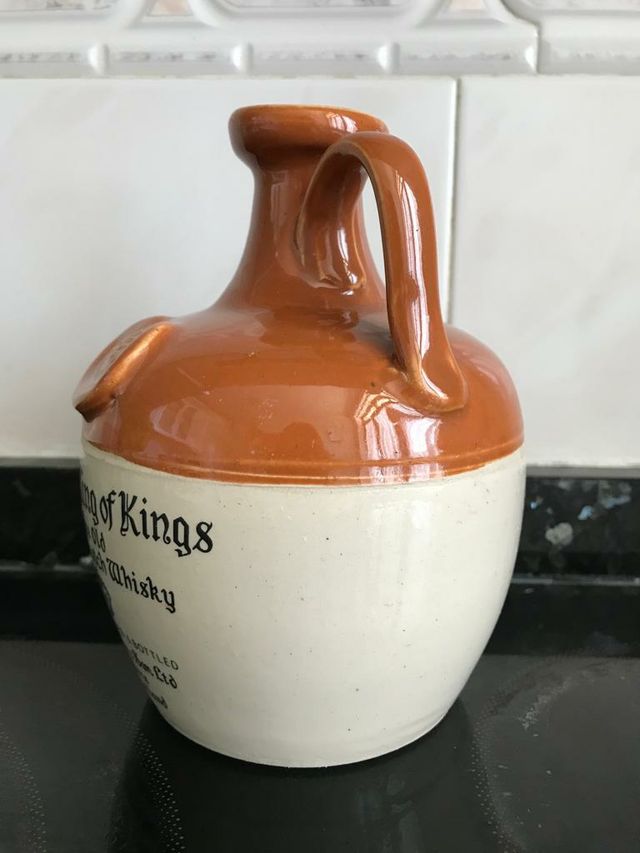 Botella vacía de whisky Munro's King of Kings