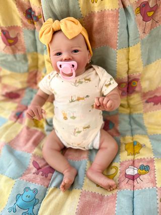 bebe reborn niña simpatica