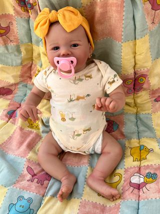 bebe reborn niña simpatica