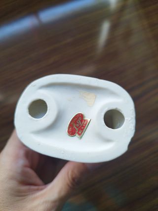 Figura de porcelana de niña con perrito