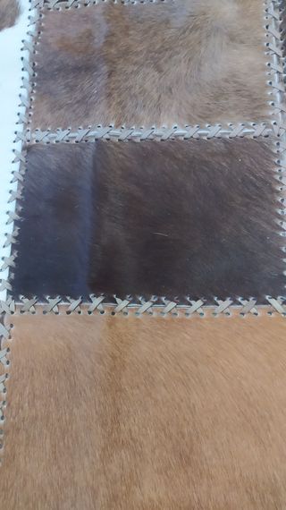 Alfombra de piel