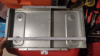 Soporte para microondas empotrado.