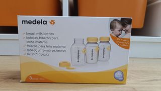 Sacaleches Medela Solo + 3 botes extra