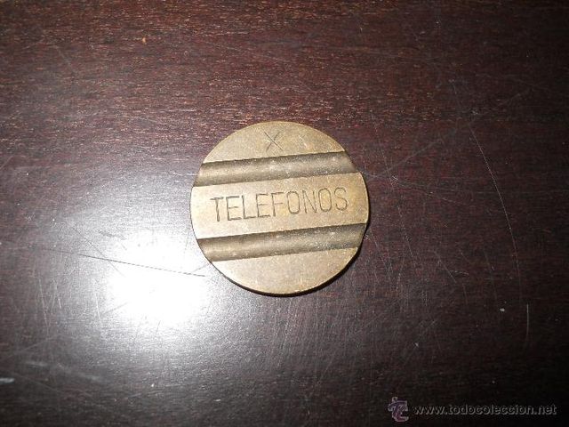Moneda teléfono antigua
