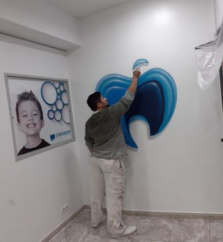 Paleta y pintor