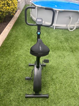 Bicicleta estática + funda sillín