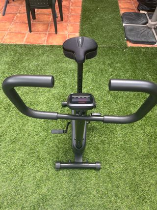 Bicicleta estática + funda sillín
