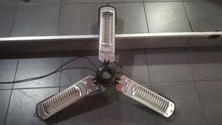 Calefactor eléctrico de brazos abatibles