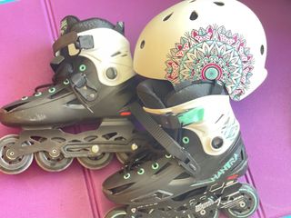 Set de Patines, casco, protección y bolso.