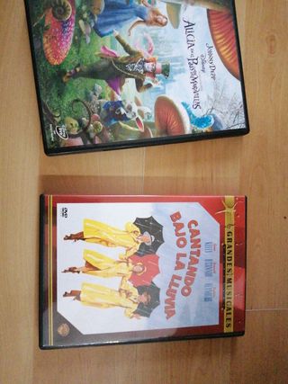 2 dvd Cantando Bajo la lluvia y Alicia e