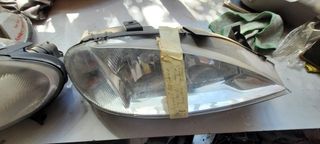 Juego faros renault megane 1996