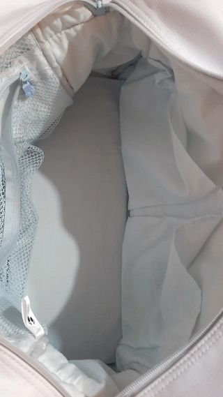 Bolso maternal tuc tuc de color azul.