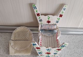 Cuna Mecedora con flores de colores