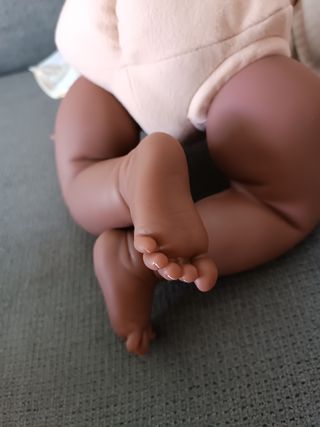 Bebé Reborn Afroamericano rizos y ojos verdes