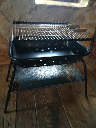 Parrilla portatil plegable.