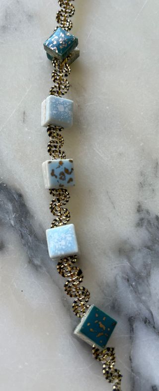 Antiguo rosario con teselas y pasamaneria