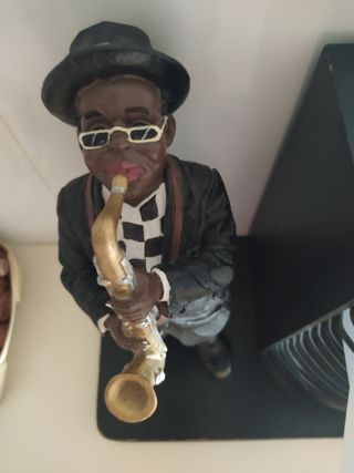 Porta CD o cartas figura saxofonista