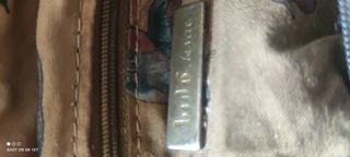 Maravilloso bolso de piel vuelta, ante