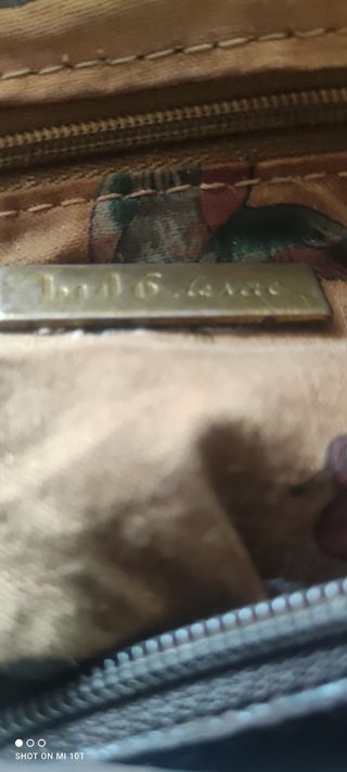 Maravilloso bolso de piel vuelta, ante