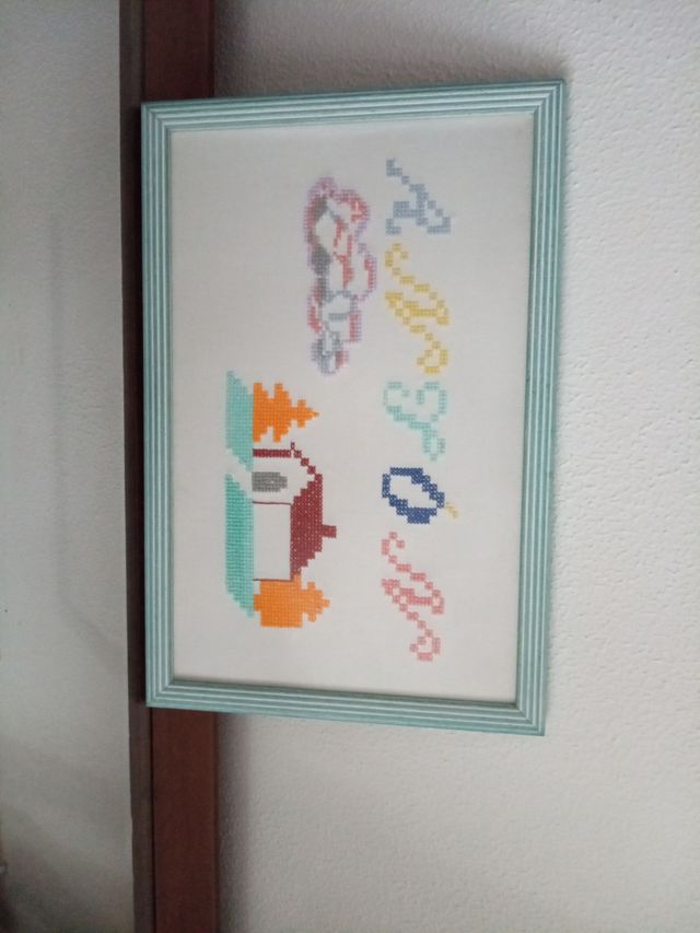 Cuadro de punto de cruz con nombre