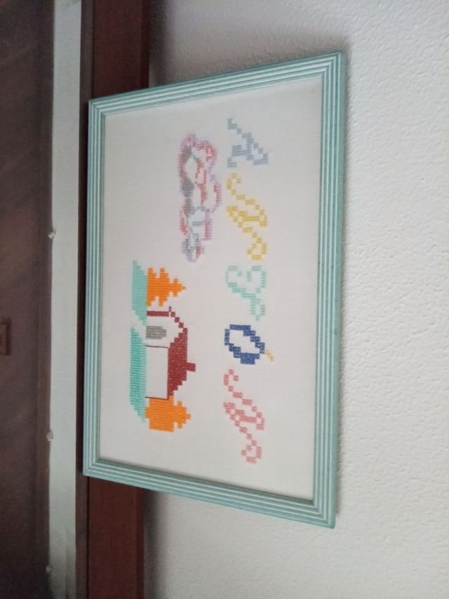 Cuadro de punto de cruz con nombre