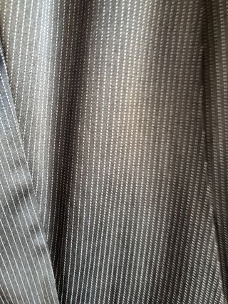 traje