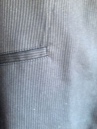 traje
