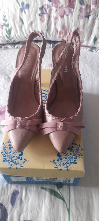 Zapatos rosa empolvado nuevos