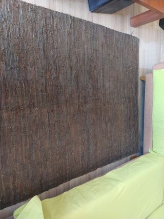 Alfombra tiras de piel