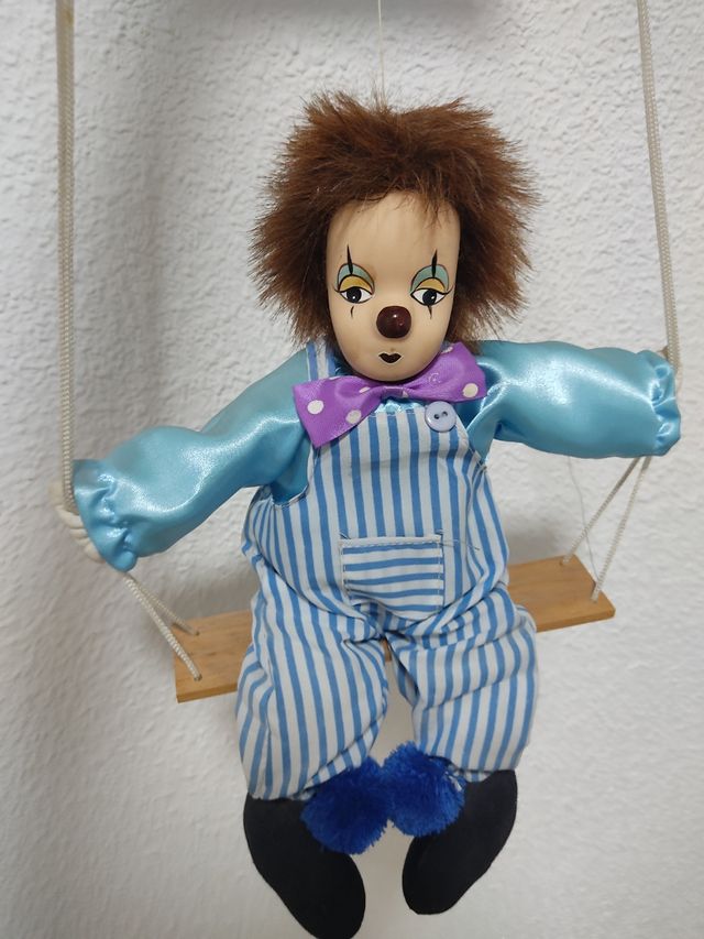 Marioneta columpio payaso