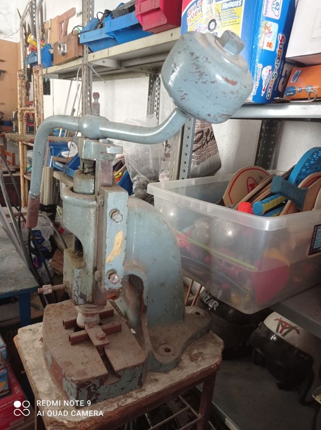 prensa manual antigua para juntas