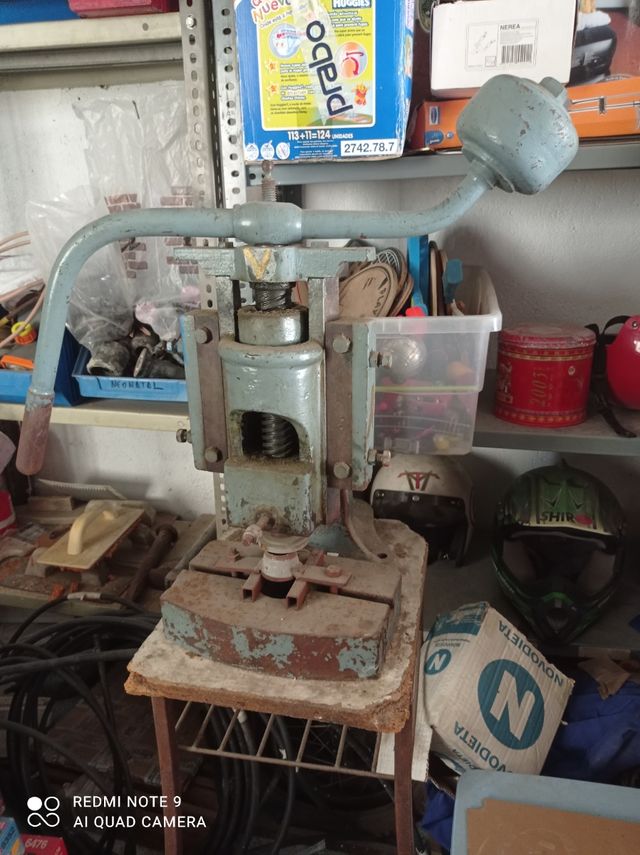 prensa manual antigua para juntas