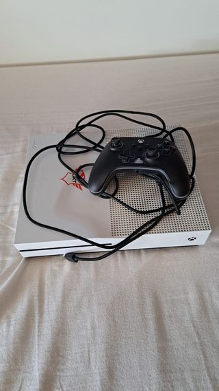  una Xbox one con volante por 200 