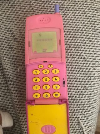 antiguo telefono muñeca polly poket.