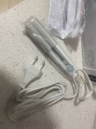 Plancha de pelo de viaje.