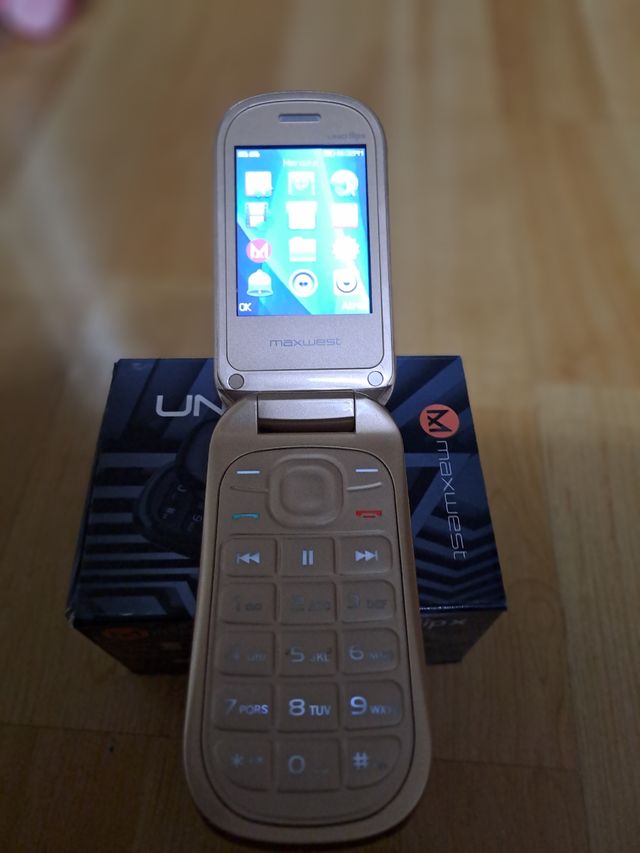 Movil sin usar color dorado champán 