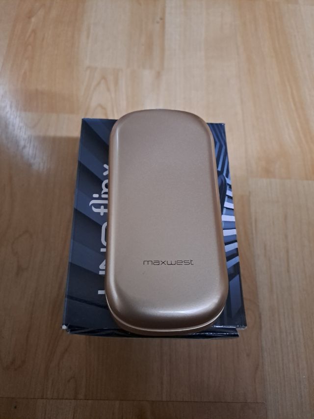 Movil sin usar color dorado champán 