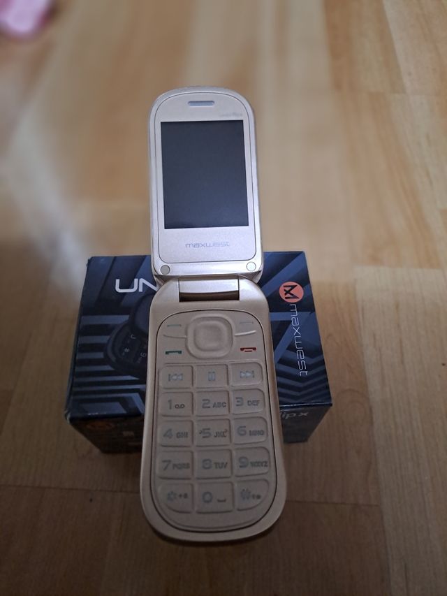 Movil sin usar color dorado champán 