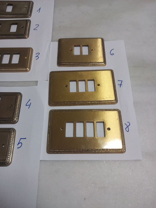 Placa bronce enchufes