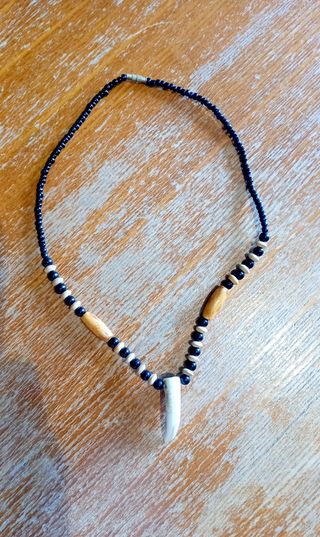 Collana con dente