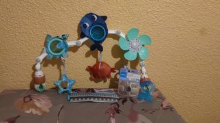 juguete para cochecito con clip universal