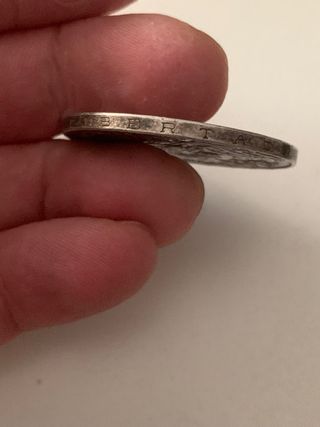 moneda antigua de plata