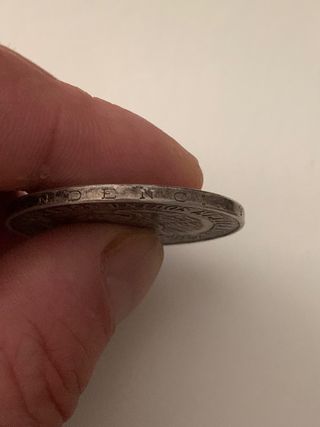 moneda antigua de plata