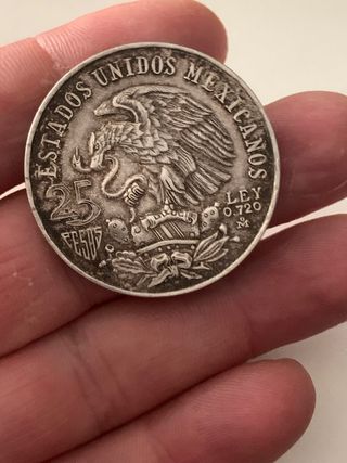 moneda antigua de plata