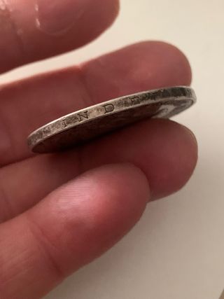 moneda antigua de plata