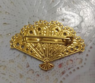 Broche abanico santa faz