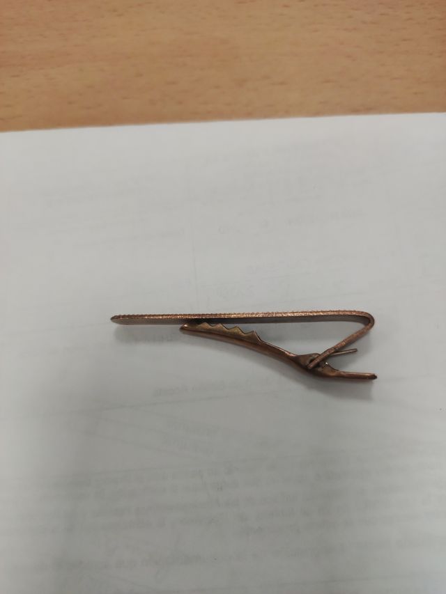 sujeta corbatas antiguo