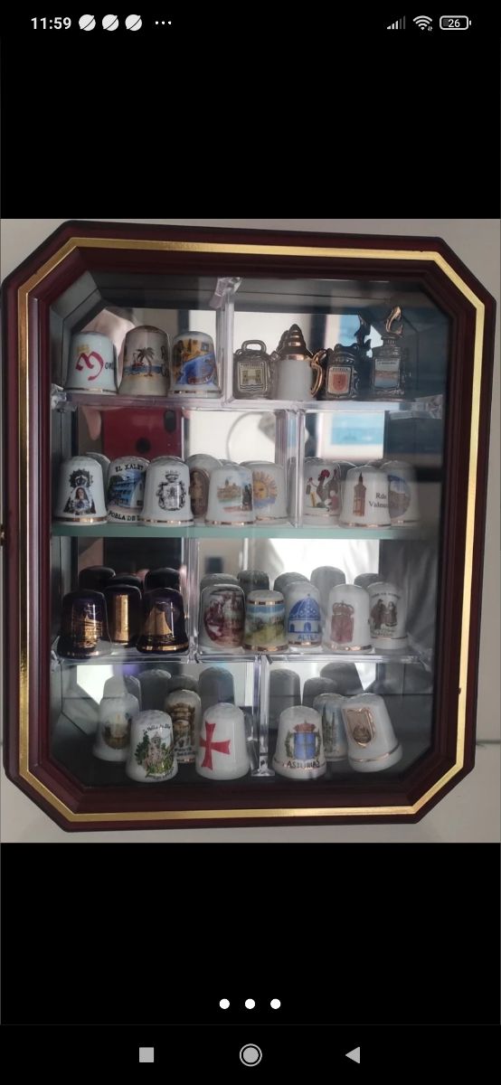 Vitrina con sus dedales